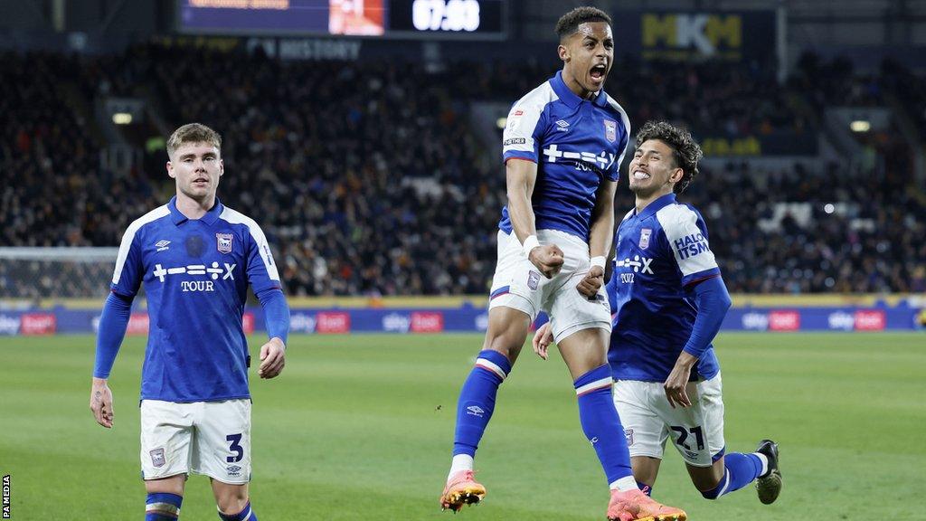 Omari Hutchinson celebrates with his Ipswich teammates