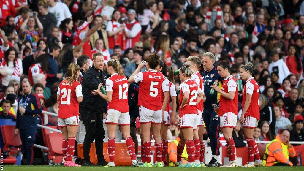 Arsenal playing at the Emirates Stadium