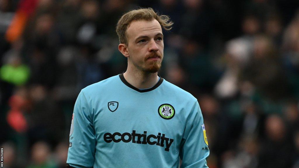 Lewis Thoams stands on the pitch during a game for Forest Green last season