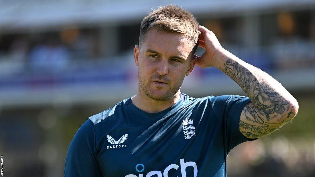 England batter Jason Roy puts his hand on the side of his head during a warm-up