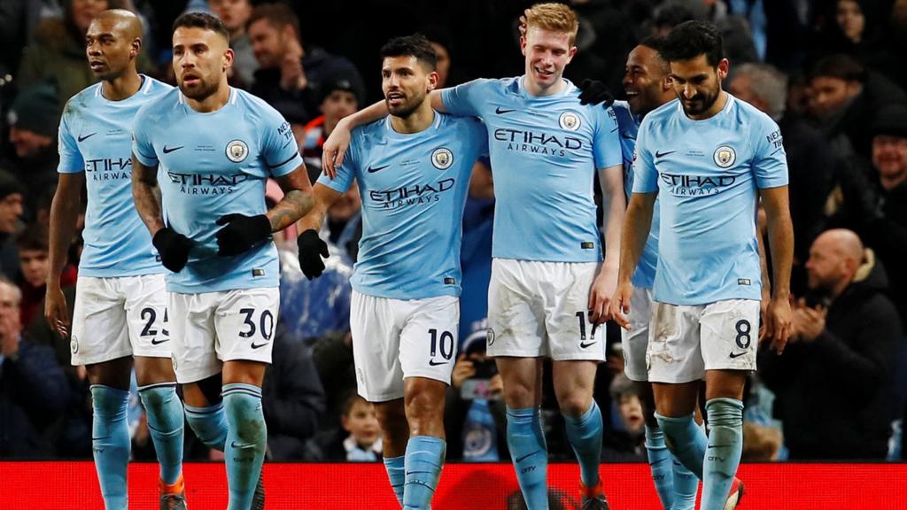 Man City players celebrate