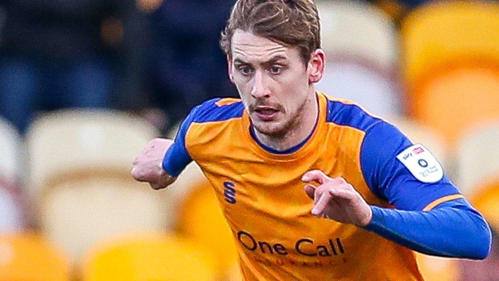 Elliott Hewitt in action for Mansfield Town