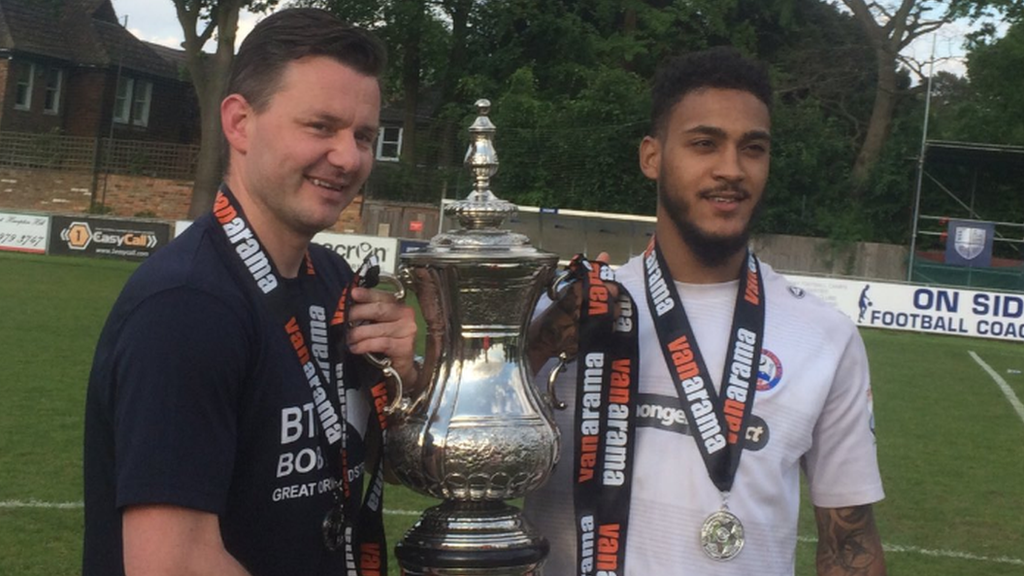 Braintree celebrate with the play-off winners' trophy