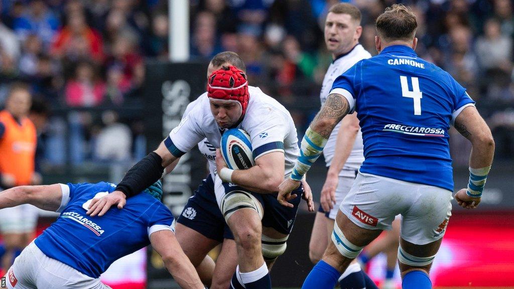 Grant Gilchrist carries the ball in the loss against Italy