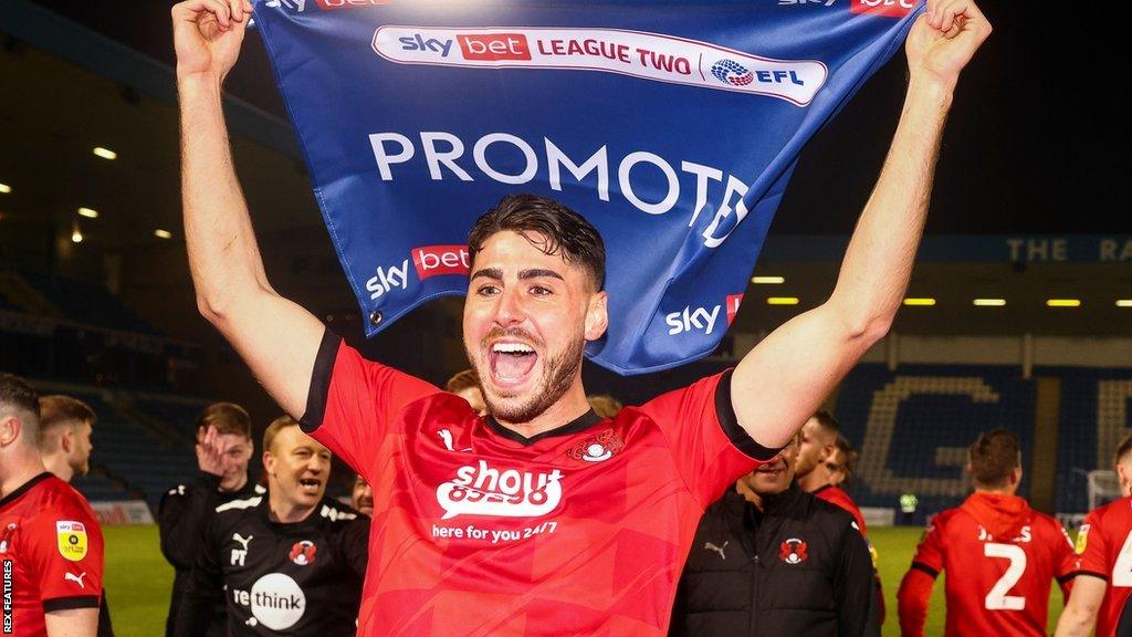 Dan Happe celebrates Leyton Orient's promotion to League One