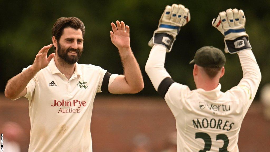 Brett Hutton celebrates taking a wicket against Somerset