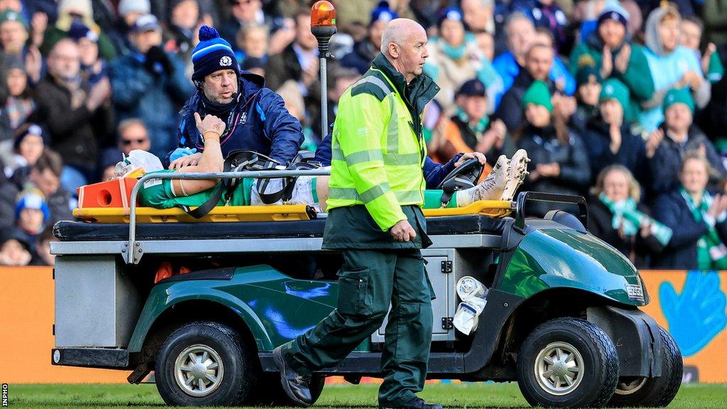 Garry Ringrose gives the thumbs up after being stretchered off in the closing stages of Ireland's victory over Scotland