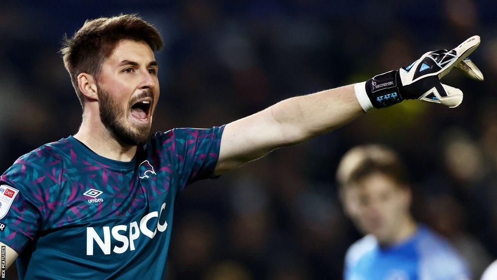 Goalkeeper Joe Wildsmith in action for Derby