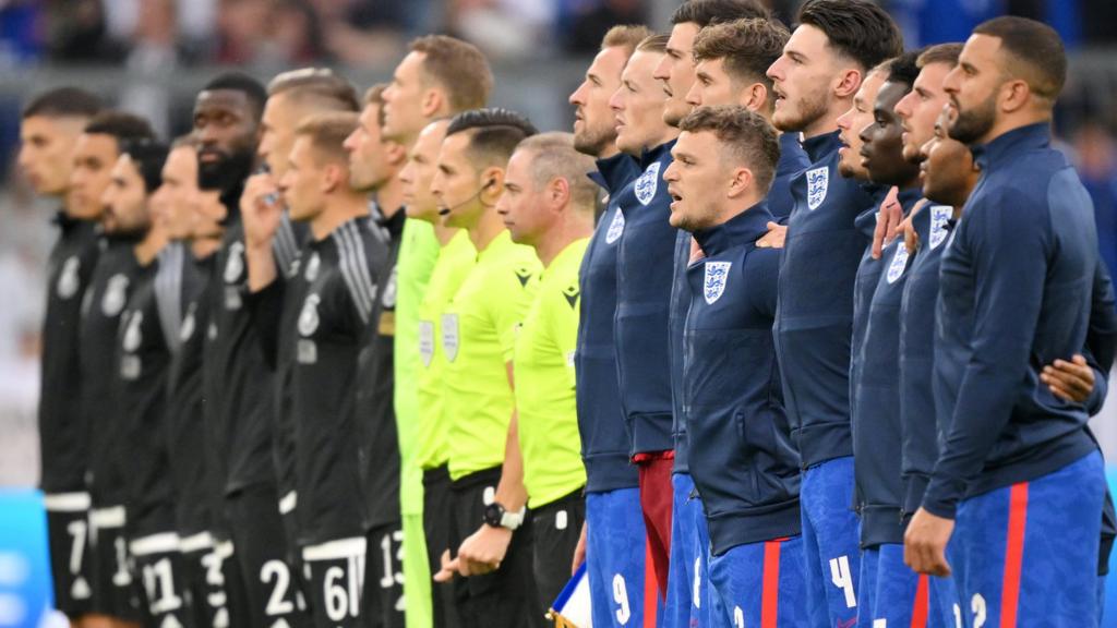 England (right) and Germany (left) players