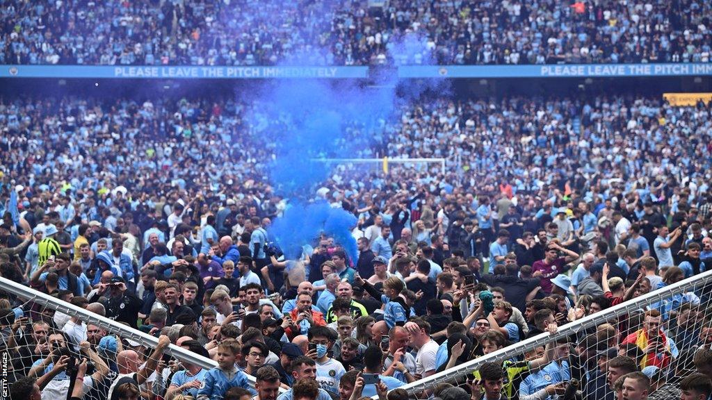 Manchester City pitch invasion