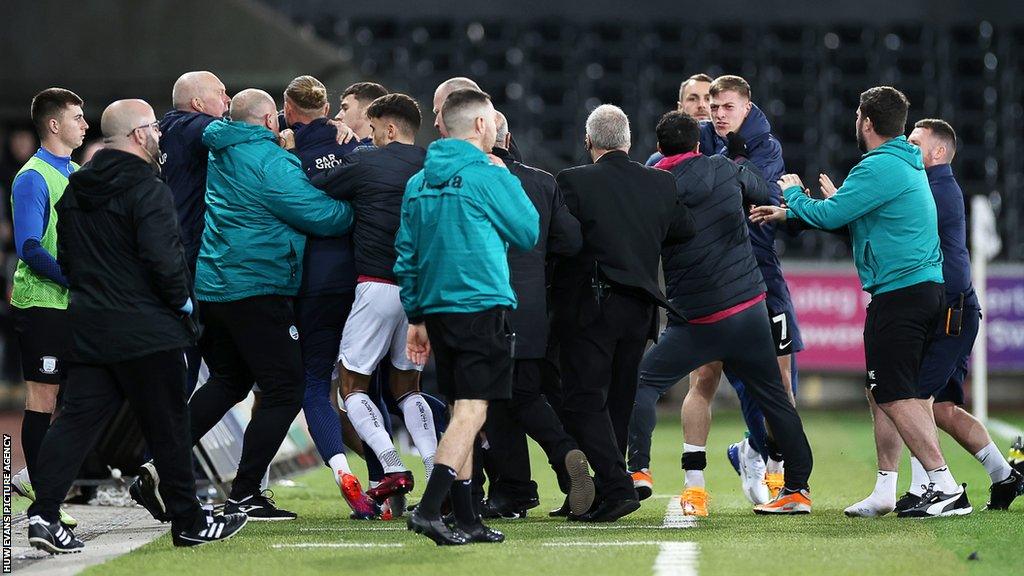 Players and staff clashed during a feisty end to Swansea's 4-2 win over Preston