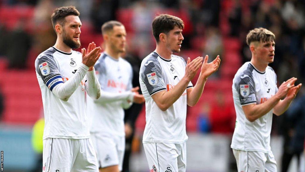 Swansea players applaud fans after defeat at Bristol City last weekend