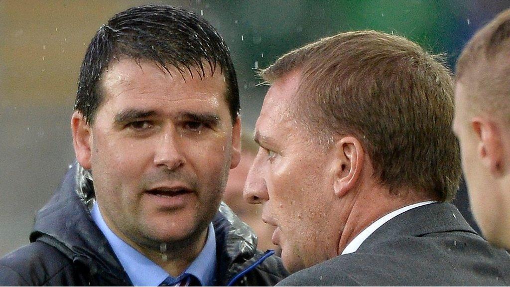 Linfield's David Healy with Celtic manager Brendan Rodgers