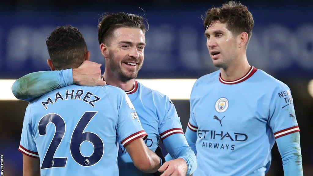 Jack Grealish and Riyad Mahrez celebrate Manchester City's winner at Chelsea