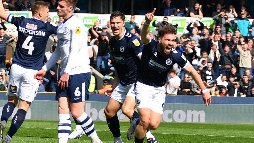 Tom Bradshaw (right) celebrates his goal for Millwall against Preston