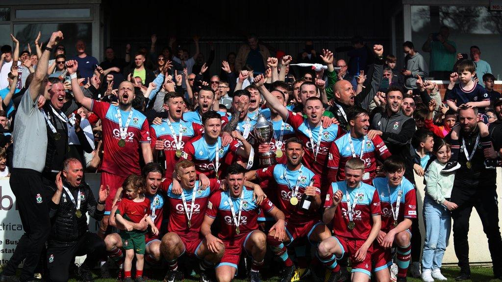 Colwyn Bay players celebrate their Cymru North title wins with their supporters