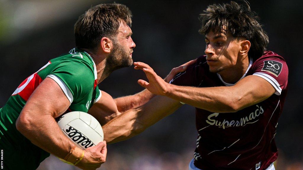 Galway's Sean Fitzgerald challenges Mayo's Aidan O'Shea