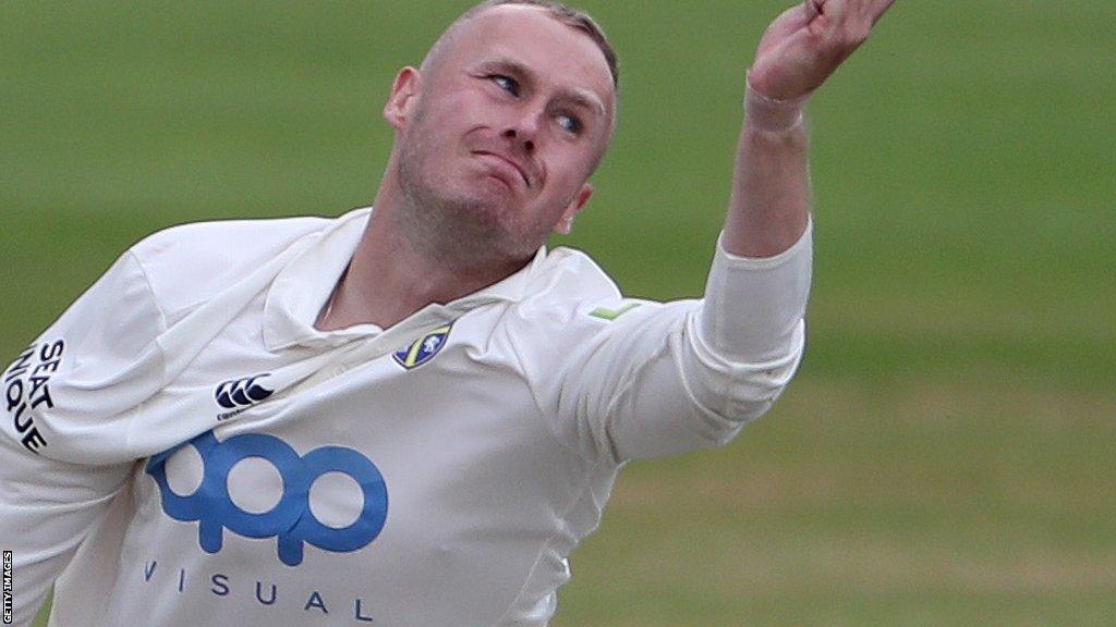 Matt Parkinson bowling for Durham