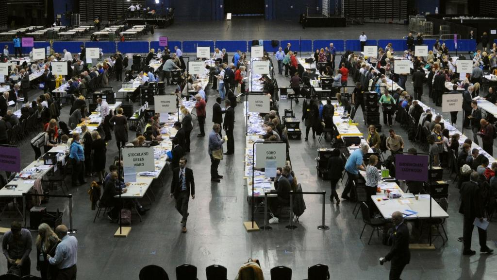 Election count staff count ballot papers at Birmingham's Barclaycard Arena