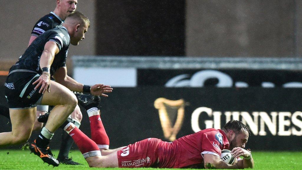 Alex Jeffries scores a try for Scarlets