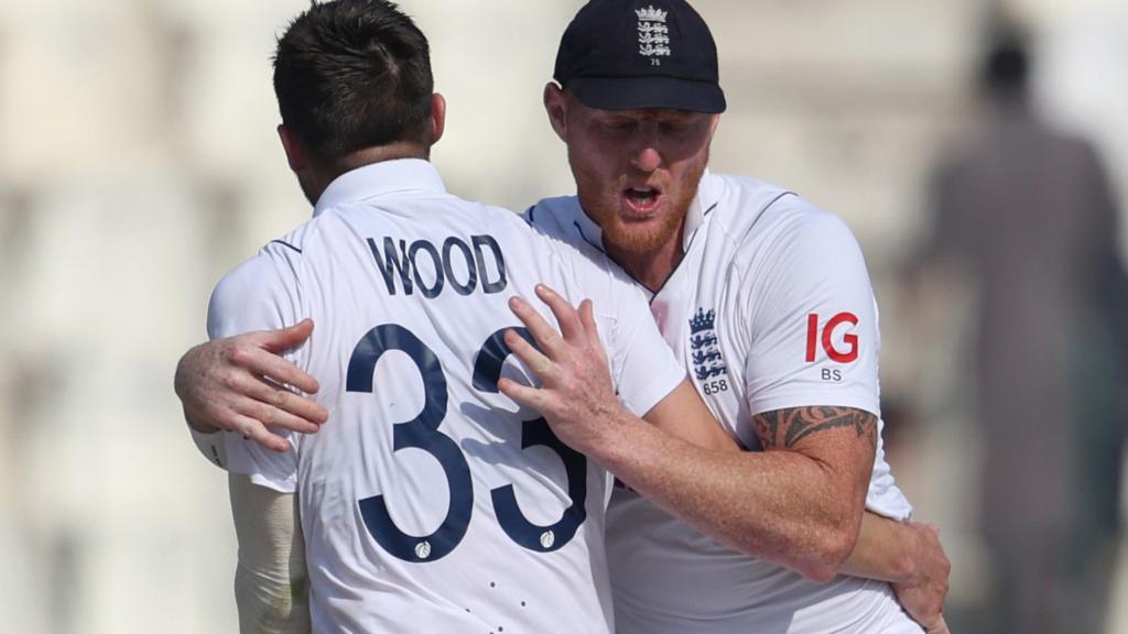 Mark Wood and Ben Stokes embrace