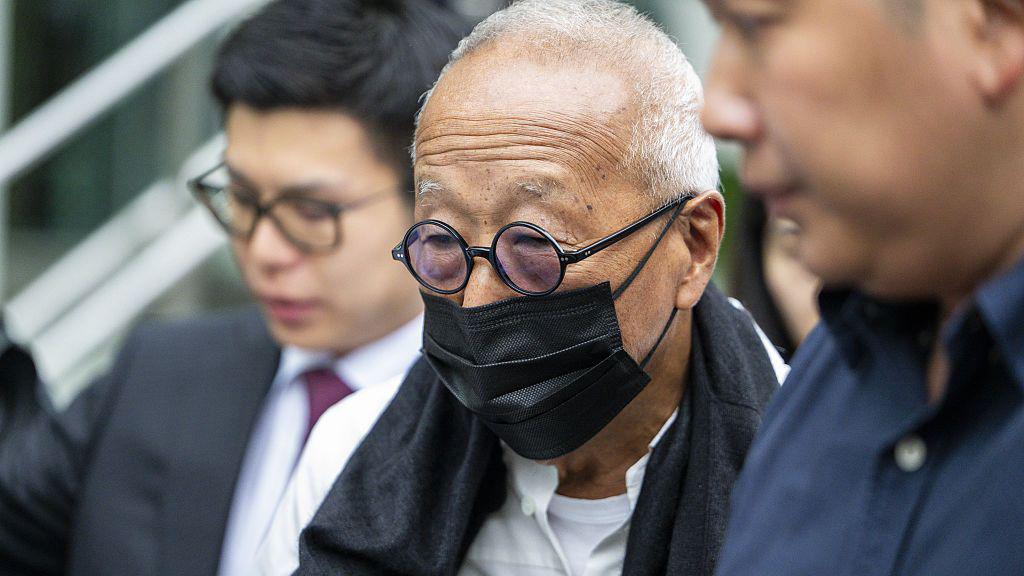 Ong Beng Seng wearing a black mask and round spectacles