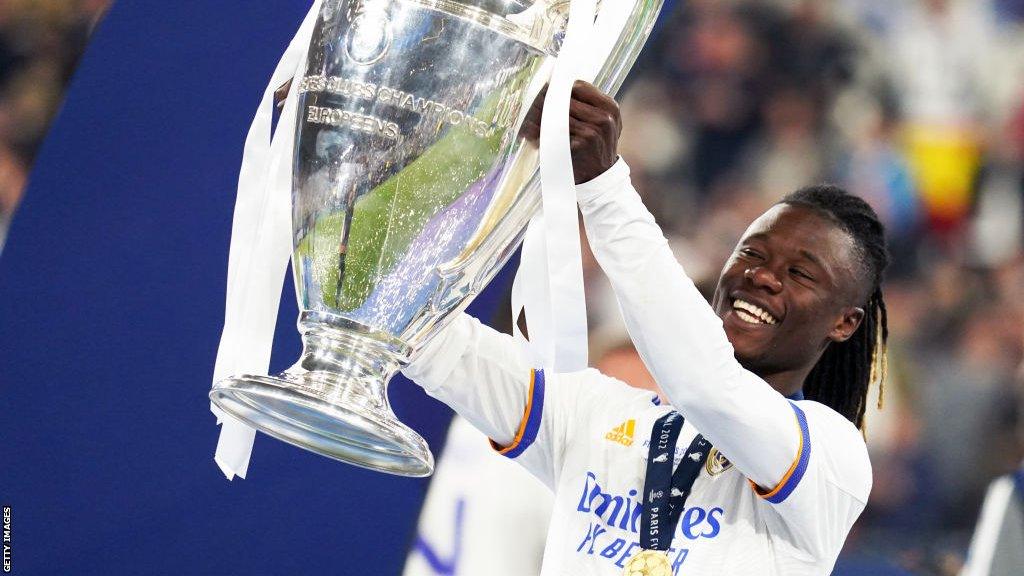 Eduardo Camavinga of Real Madrid celebrates with the Champions League trophy