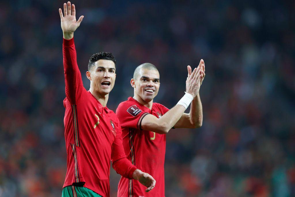 Cristiano Ronaldo and Pepe wave to the Portuguese supporters