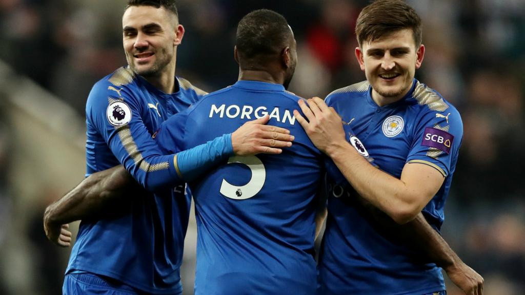 Leicester City"s Vicente Iborra, Wes Morgan and Harry Maguire celebrate after the match