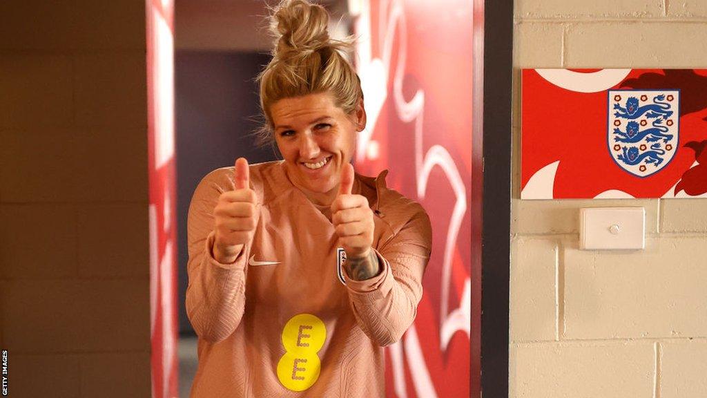 Millie Bright giving thumbs up in the England training ground