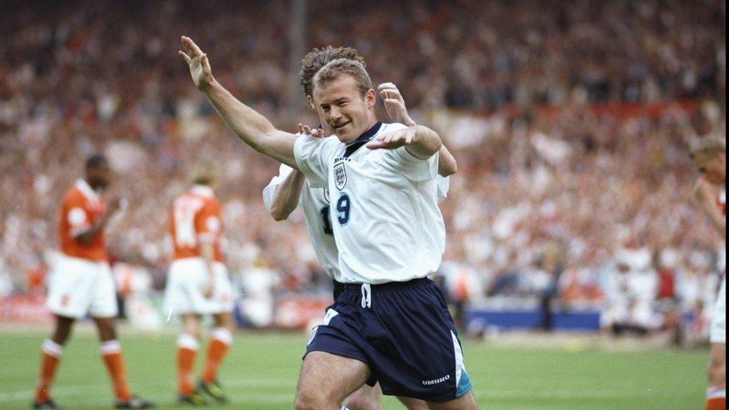 Alan Shearer celebrates scoring for England