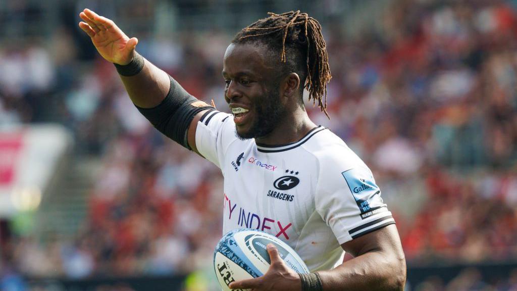 Winger Rotimi Segun celebrates scoring for Saracens.