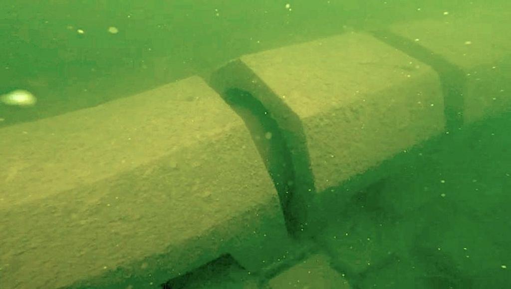 An underwater image of a sewage discharge pipe in Windermere