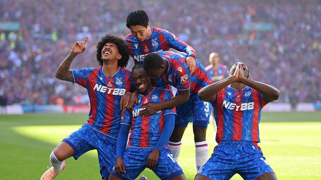 Eberechi Eze of Crystal Palace celebrates scoring his team's first goal with teammates during the Emirates FA Cup Final match