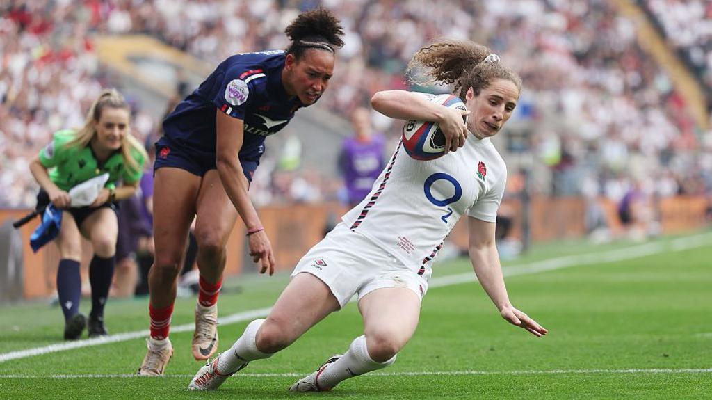Abby Dow scores against France