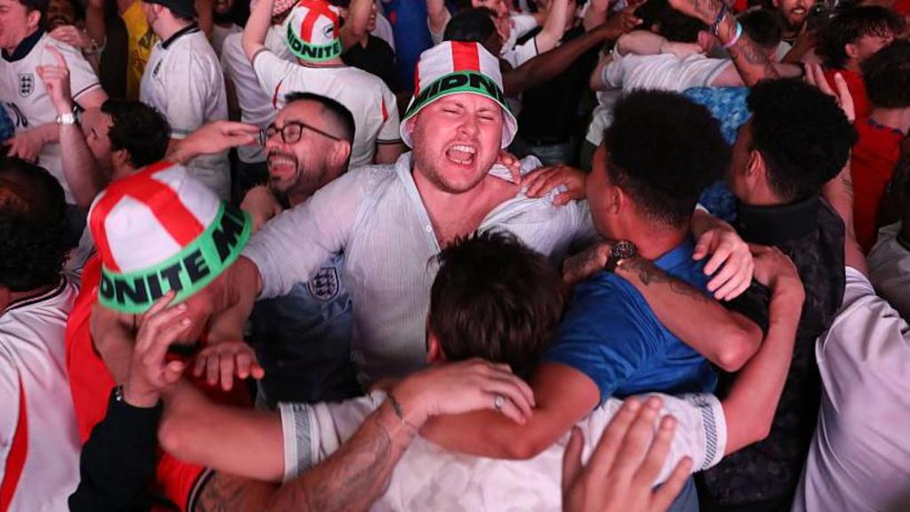 England fans cheer during a watch party at Boxpark Croydon for the FIFA World Cup 2026 Round of 16 match between Mexico and England on July 6, 2026 in London, England. 