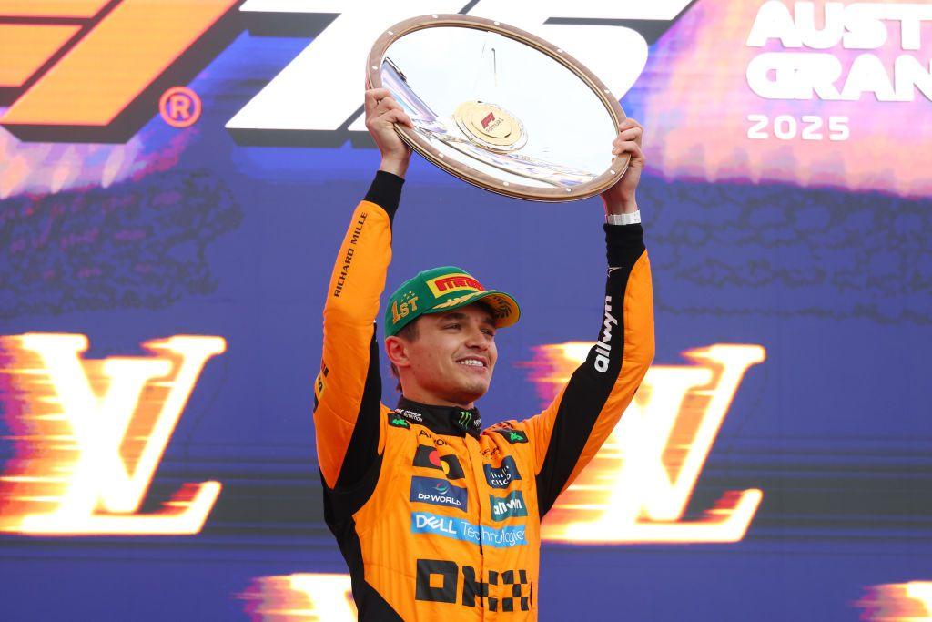 Lando Norris holds up the winner's trophy at the Australian Grand Prix