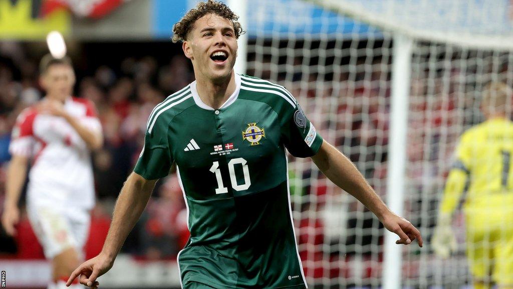 Dion Charles celebrates after scoring Northern Ireland's second goal against Denmark