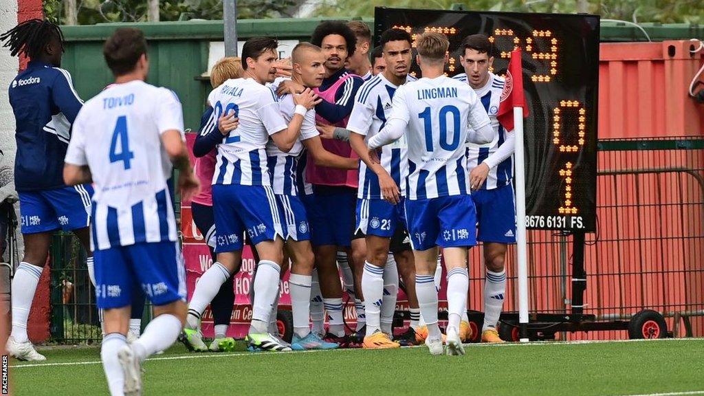 HJK Helsinki players celebrate Tuomas Ollila's first-half strike