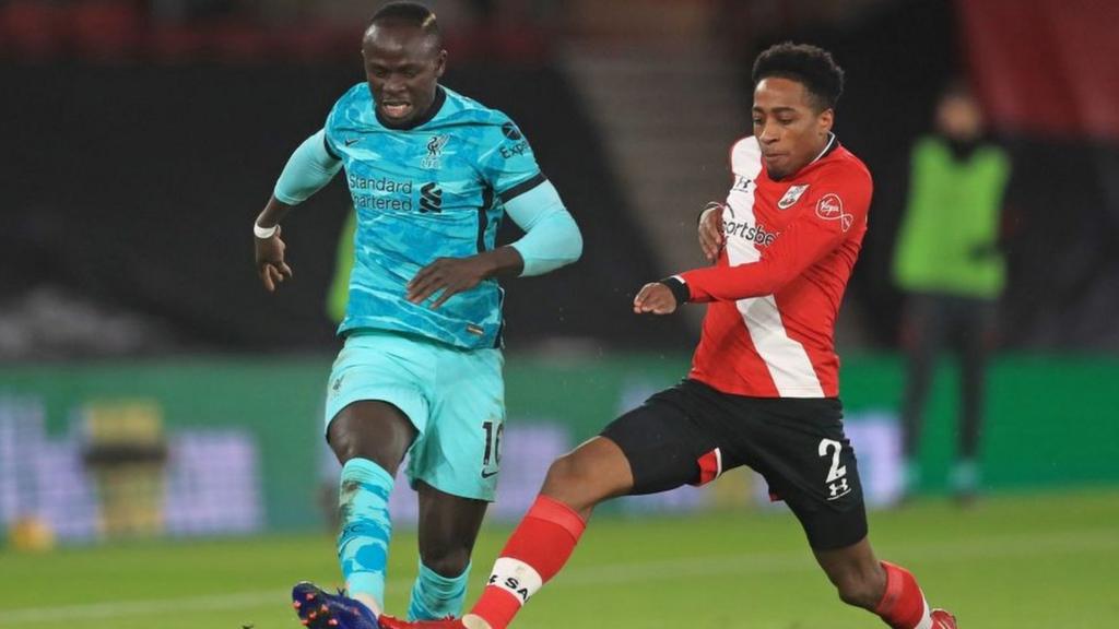 Liverpool's Sadio Mane and Southampton's Kyle Walker-Peters