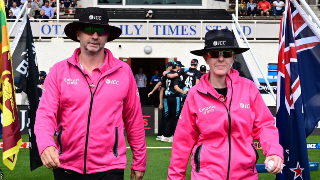 Wayne Knights and Kim Cotton walk out to the middle