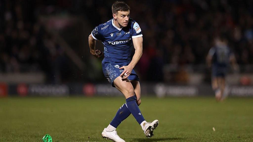 George Ford kicks a conversion attempt for Sale Sharks