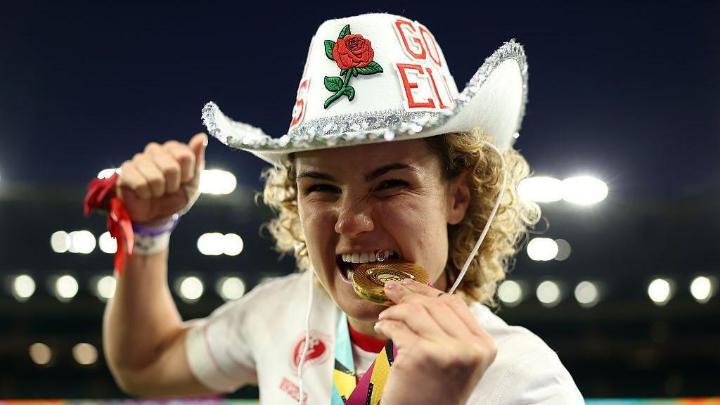 Ellie Kildunne bites her World Cup winner's medal