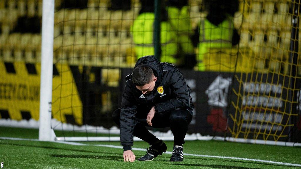 Referee Matthew MacDermid called off the game after a second inspection