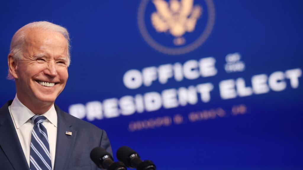 U.S. President-elect Joe Biden smiles as he talks about protecting the Affordable Care Act (ACA) while speaking to reporters about his "plan to expand affordable health care" during an appearance in Wilmington, Delaware, U.S., November 10, 2020