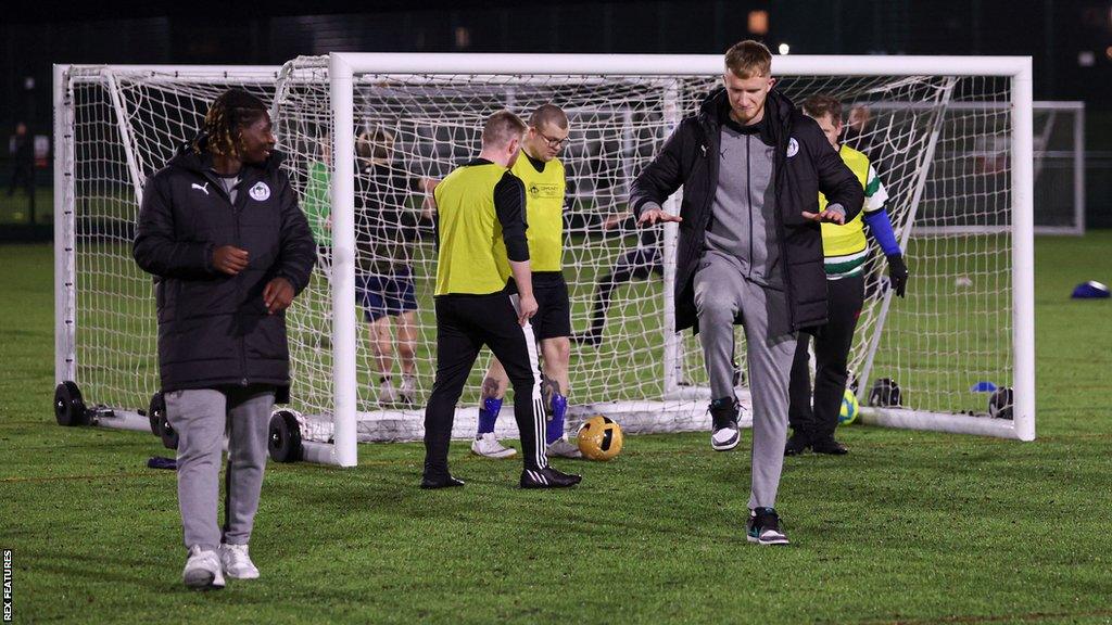 Wigan players Baba Adeeko (left) and Liam Morrison (right) at the Every Player Counts event