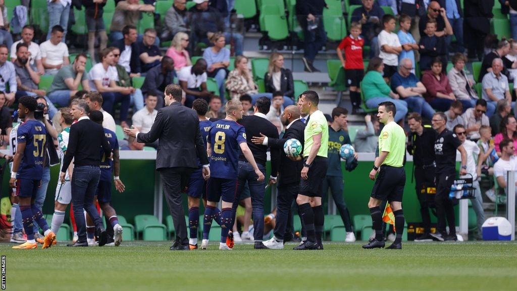 Groningen and Ajax players come off