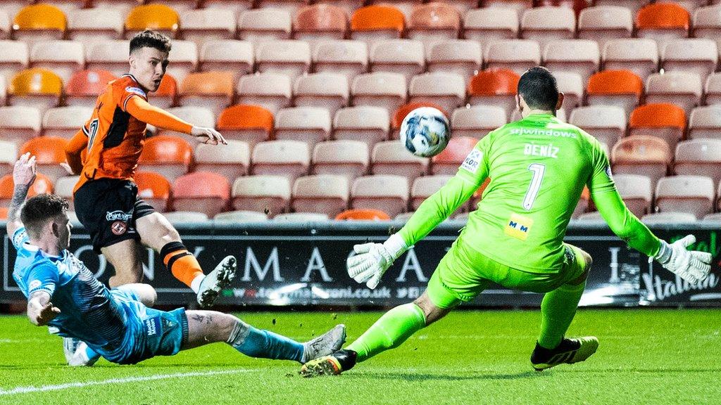 Archie Meekison shoots v Dunfermline