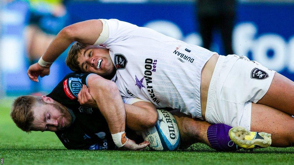 Glasgow Warriors' Kyle Steyn (bottom) scores a try