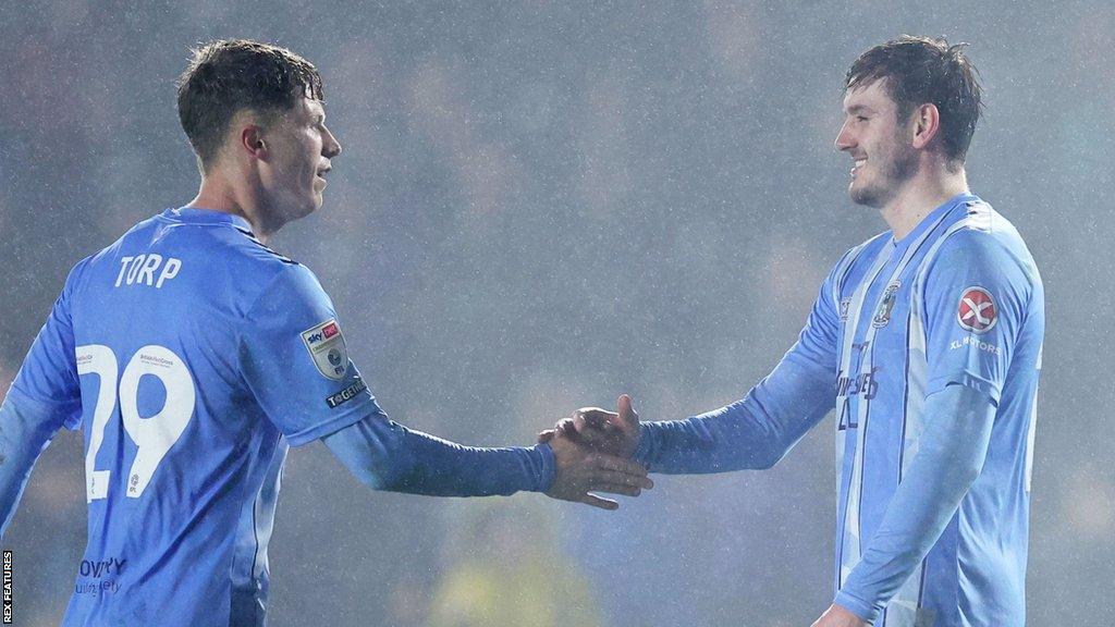 Coventry City celebrate Liam Kitching's late goal